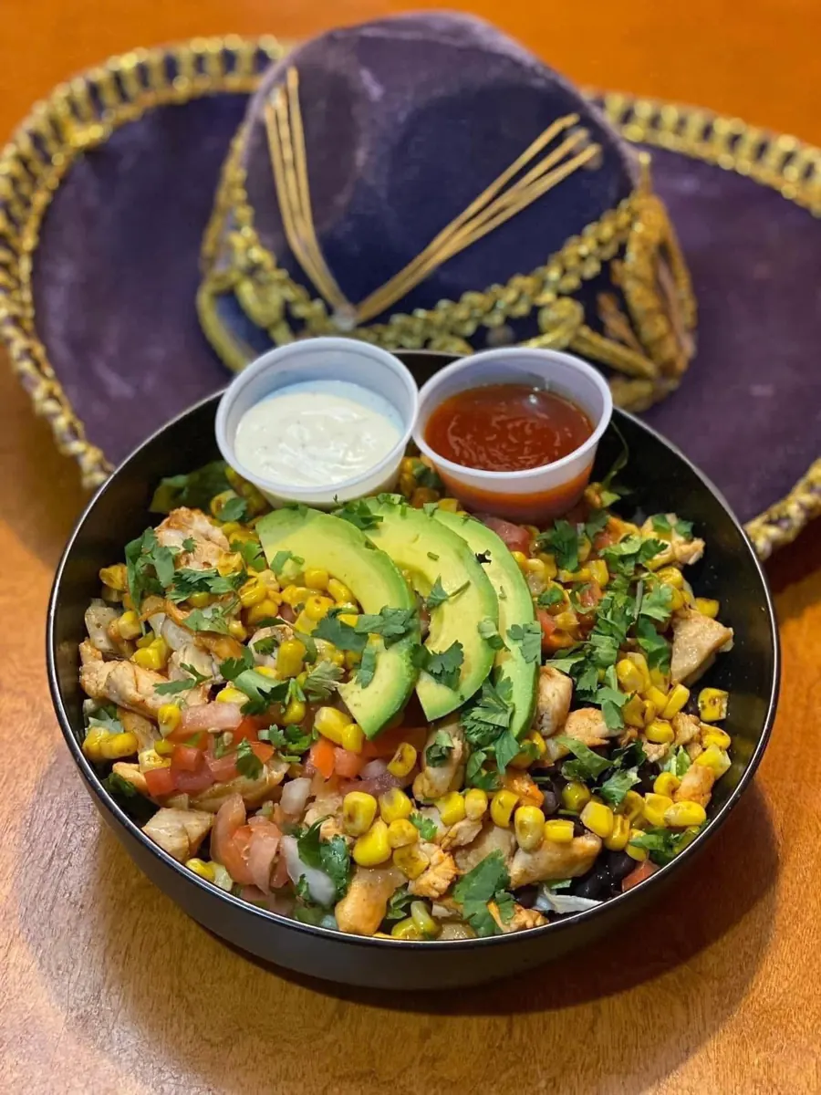 The Mi Casa Bowl with grilled chicken, corn, black beans, pico de gallo and avocado