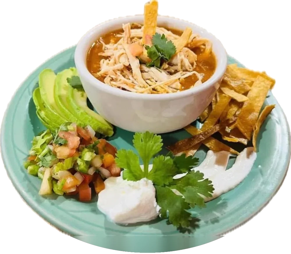 New seasonal chicken tortilla soup with avocado, pico de gallo and tortilla strips